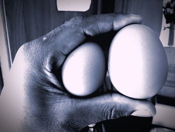 Close-up of hand holding ice cream