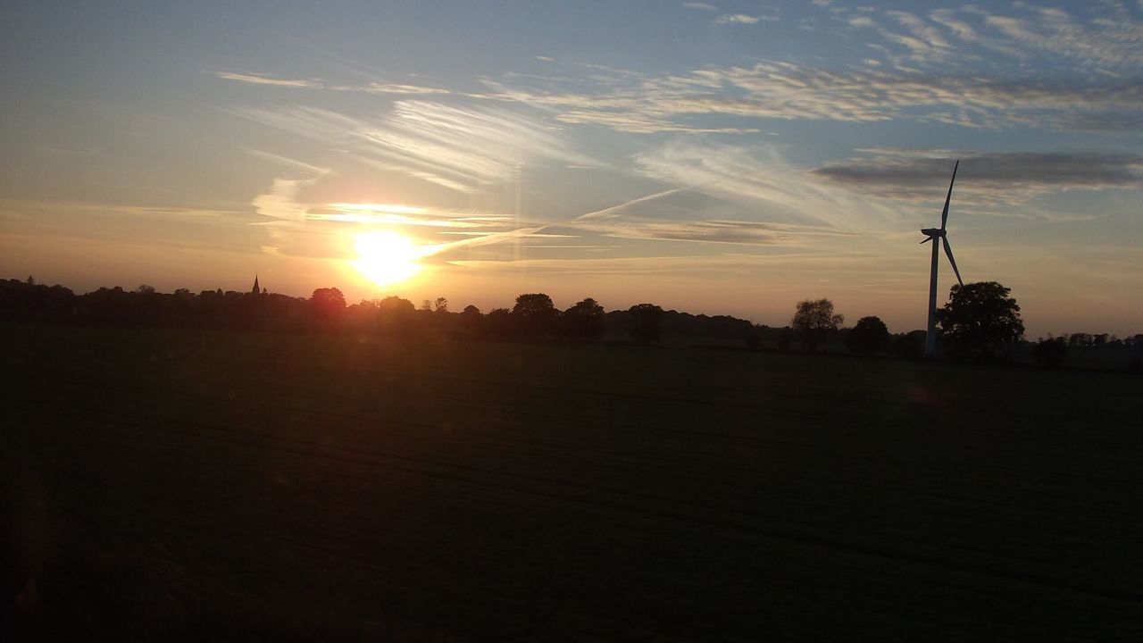 SCENIC VIEW OF SILHOUETTE LAND AGAINST SKY DURING SUNSET