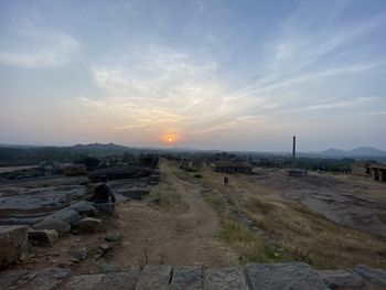 Scenic view of landscape against sky during sunset