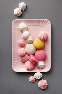 High angle view of multi colored candies on table