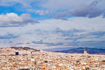 Aerial view of townscape against sky