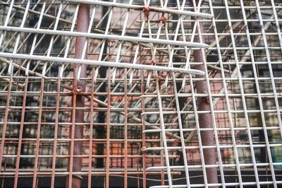 Full frame shot of metal in cage