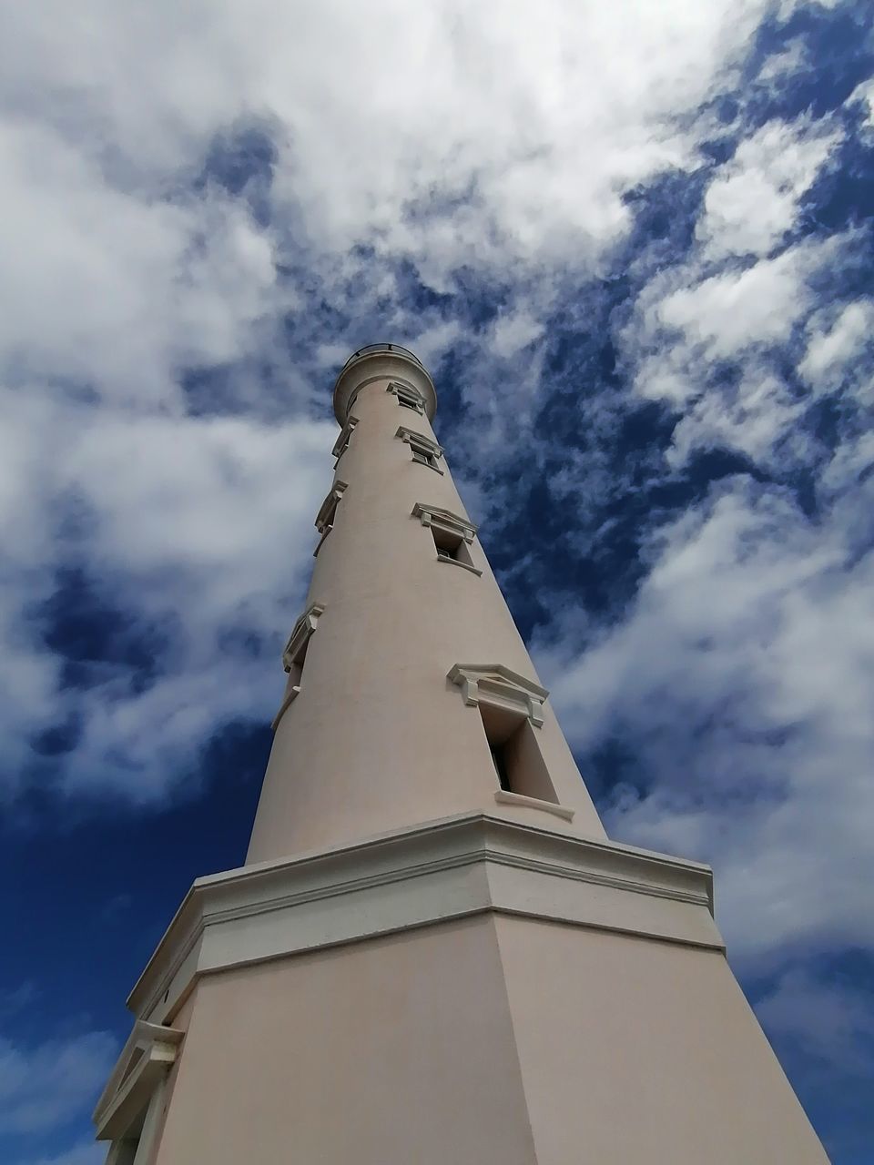 LOW ANGLE VIEW OF SMOKE STACKS AGAINST SKY