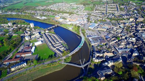 High angle view of river amidst buildings in city