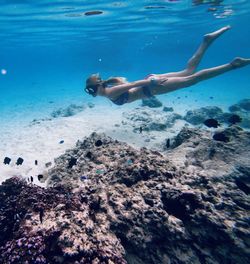 Man swimming in sea