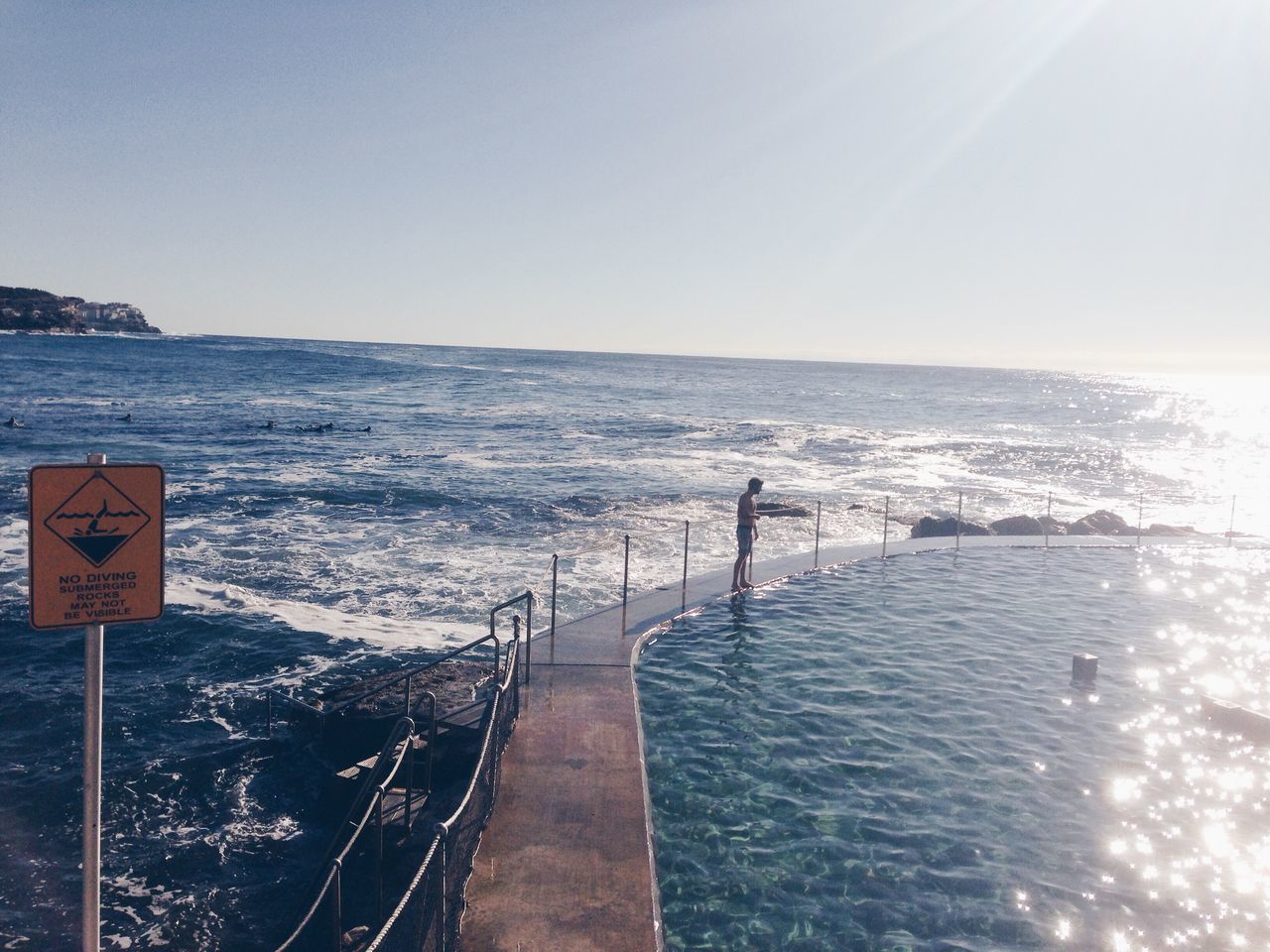 sea, water, horizon over water, clear sky, scenics, tranquil scene, tranquility, beach, beauty in nature, nature, copy space, shore, sky, wave, idyllic, blue, outdoors, surf, the way forward, coastline