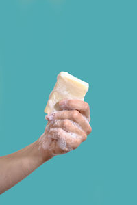 Woman hold piece of soap. hygiene concept