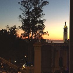 View of built structures at sunset