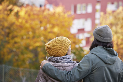 Happy couple in autumn scenery