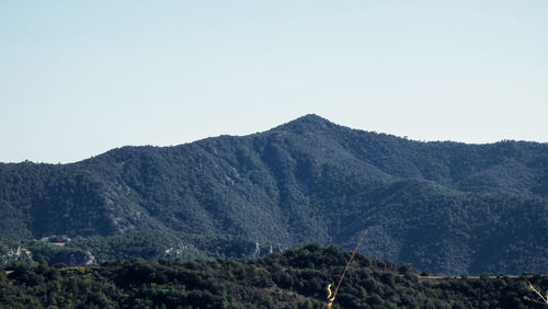 Scenic view of mountains against clear sky