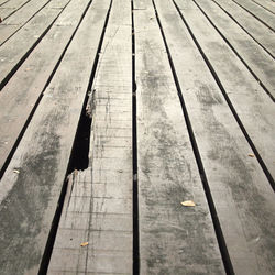 High angle view of boardwalk on pier