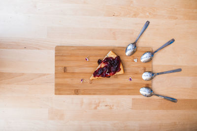 High angle view of ice cream on wooden table