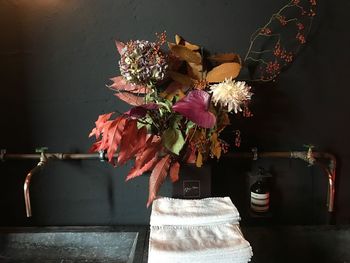 Close-up of flower vase on table