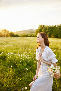 Young woman holding bouquet