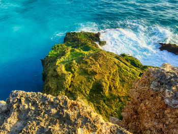 High angle view of rocks on beach