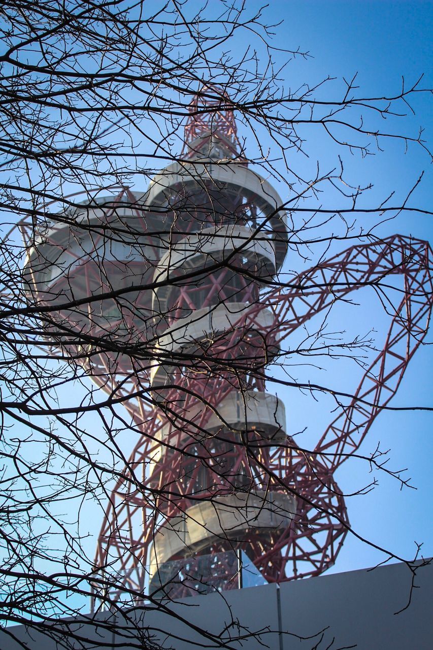 LOW ANGLE VIEW OF TOWER AND TREE AGAINST SKY