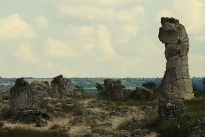 View of rock formations against sky