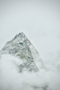 Scenic view of snowcapped mountain against sky