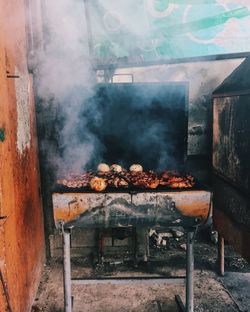 High angle view of meat on barbecue grill