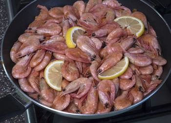 High angle view of meat in cooking pan