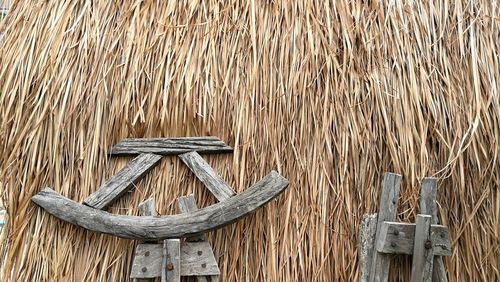 Wood against hay at farm