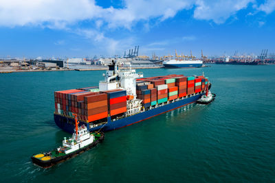 Aerial view container cargo ship carrying commercial container in import export business 