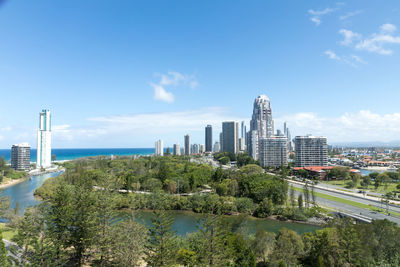 Buildings in city against sky