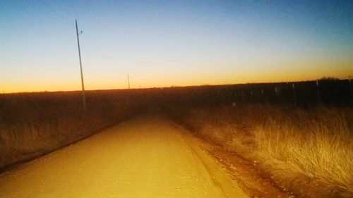 Scenic view of landscape at sunset