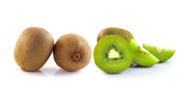 Close-up of fruits against white background