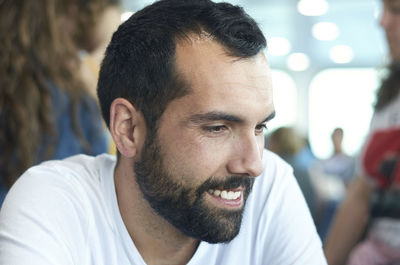 Portrait of young man looking away