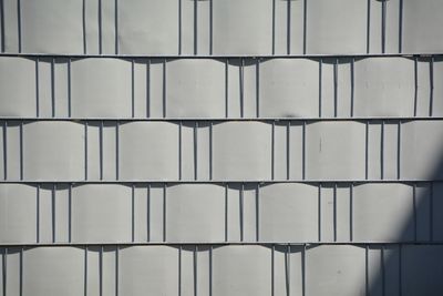 Full frame shot of gray metallic fence