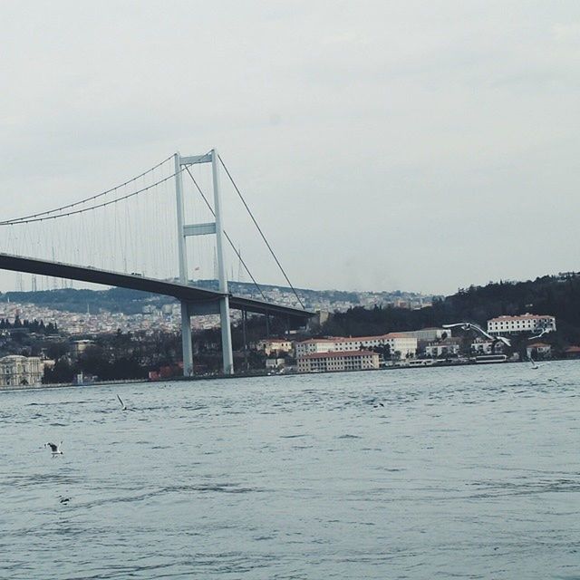 built structure, connection, architecture, bridge - man made structure, water, waterfront, river, sky, suspension bridge, engineering, sea, bridge, transportation, building exterior, city, golden gate bridge, outdoors, rippled, day, travel destinations