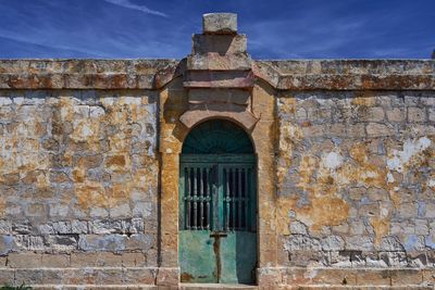 Exterior of historic building against sky