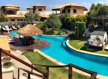 View of swimming pool against built structures