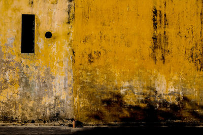 Close-up of yellow door