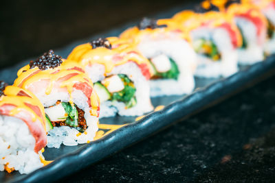 Close-up of sushi served in plate on table