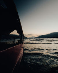 Scenic view of sea against clear sky during sunset