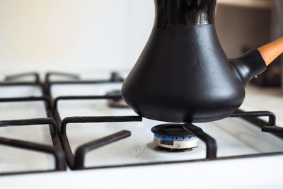 Turk on a gas stove, close-up