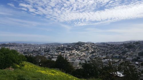 Aerial view of townscape against sky