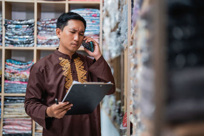 Young woman using mobile phone