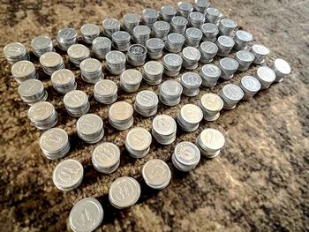 High angle view of coins on table