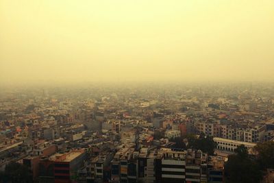 High angle shot of cityscape against clear sky