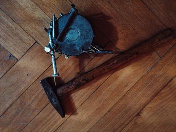 High angle view of leaf on wooden floor