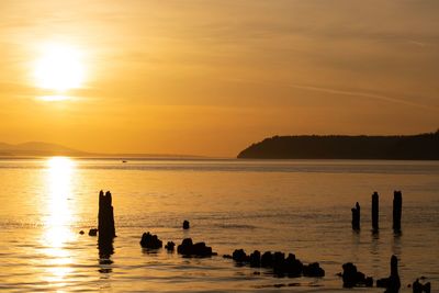 Scenic view of sea against sky during sunset