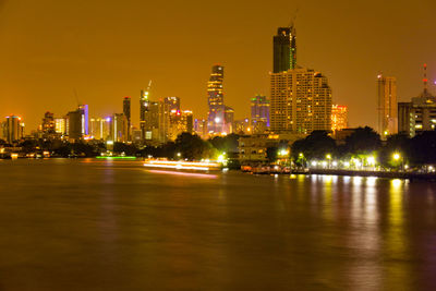 Illuminated buildings in city at night