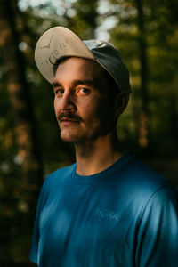 Portrait of young man looking away