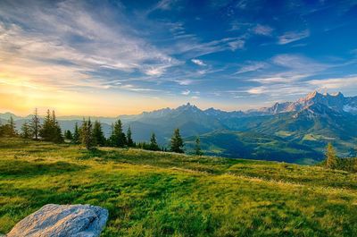 Scenic view of landscape against sky during sunset