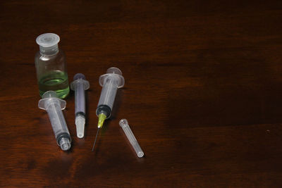 High angle view of bottles on table