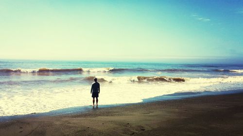 People standing on beach