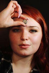 Close-up portrait of young woman